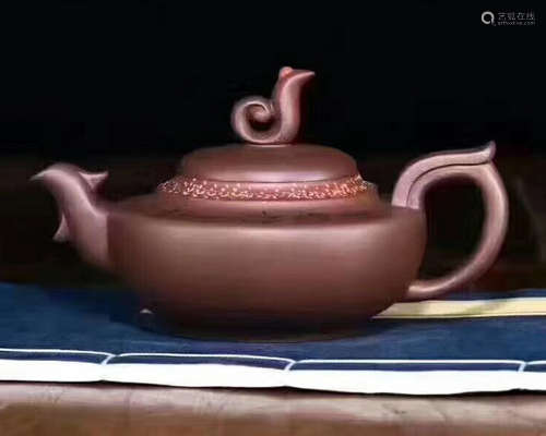 A YUXING ZISHA TEAPOT WITH WEI MARK