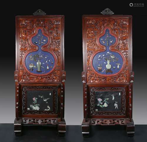 Sotheby's: Pair of Superbly Elaborated Cinnabar Screens