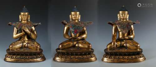 Three Gilt Bronze Buddhas Seated In Various Poses