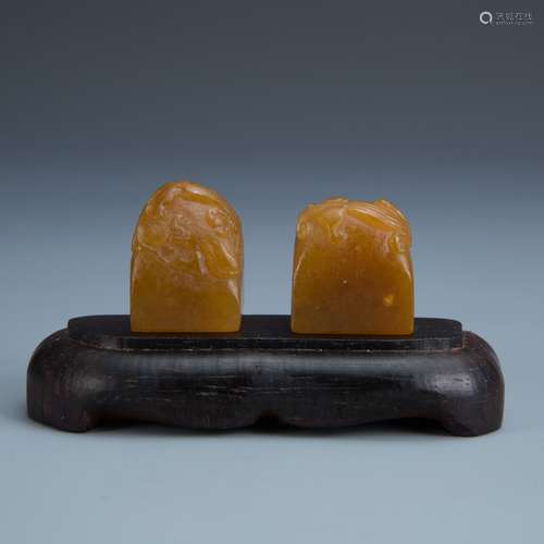 Pair of Carved Soapstone Serpent Stones on Wood Tray