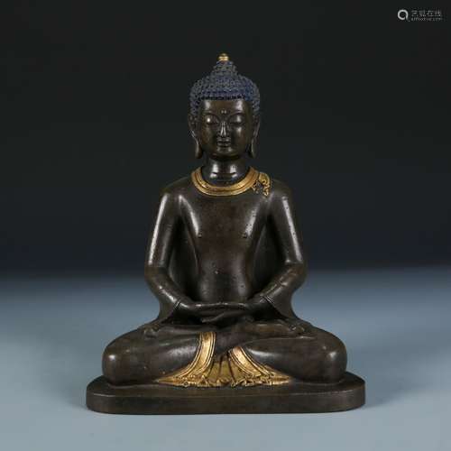 A Gilt Bronze Figure of Shakyamuni