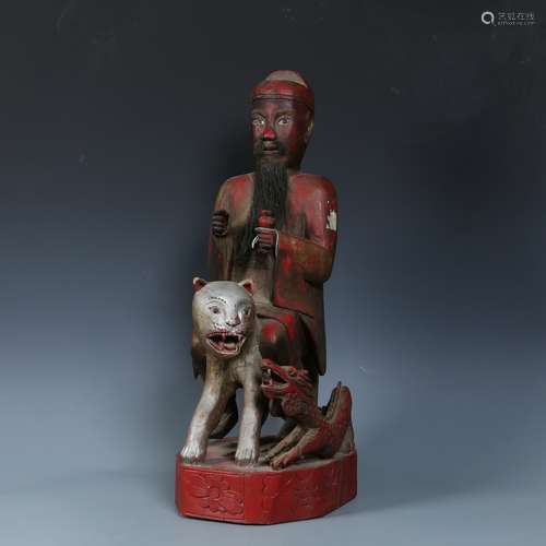 A Polychrome and Gilt-Lacquered Wooden Figure