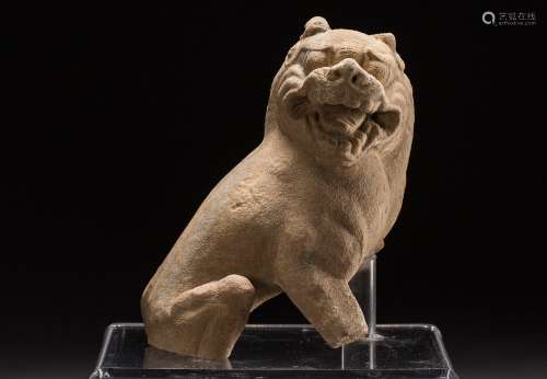 A Chinese carved stone lion from Tang Dynasty