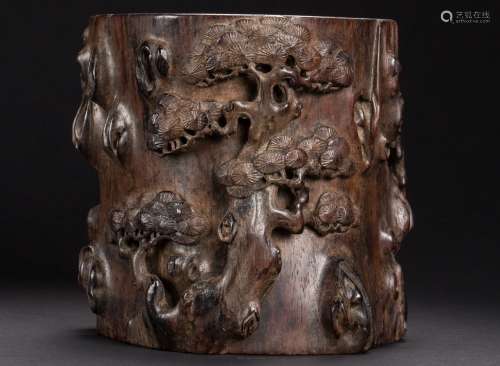 A Chinese carved pine brush pot from Qing Dynasty