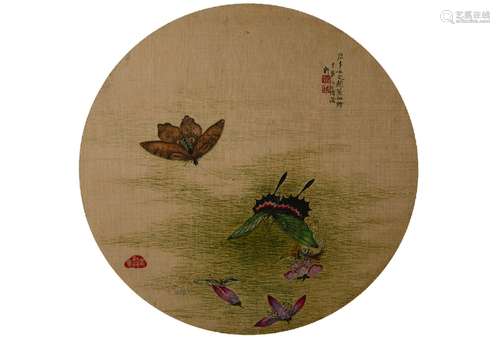 A round-framed butterflies painting