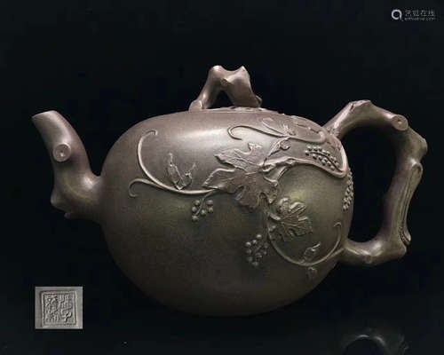 A XUFEILONG MADE ZISHA TEAPOT