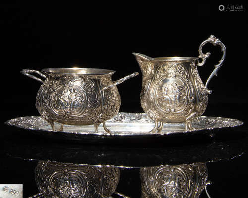 A SET OF SILVER PLATE AND COFFEE CUPS