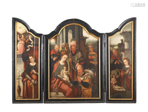 A Triptych: the central panel: The Adoration of the Magi; the left wing:  The Annunciation; and the right wing:  The Rest on the Flight into Egypt central panel: 70.6 x 73.2cm (21.2 x 28 13/16in). and wings: 73.2 x 21.2cm (28 13/16 x 8 3/8in). Follower of Pieter Coecke van Aelst(Aelst 1502-1550 Brussels)