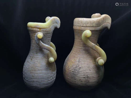 A PAIR OF HETIAN YELLOW JADE EAGLE MOUTH DESIGN POTS