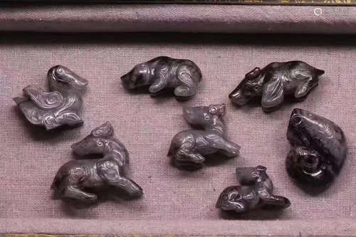 SEVEN WESTERN ZHOU DYNASTY JADE HAND PIECES