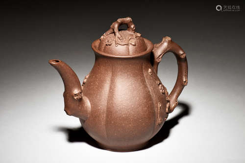 YIXING ZISHA LOBED 'PLUM FLOWERS' TEAPOT