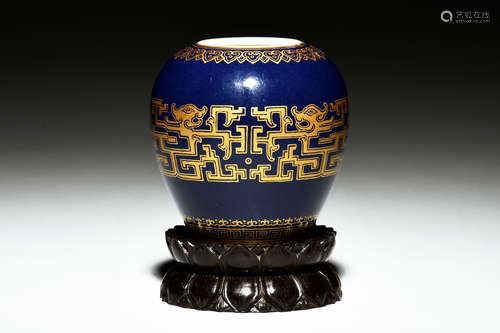 A SMALL GILTED BLUE-GLAZED JAR