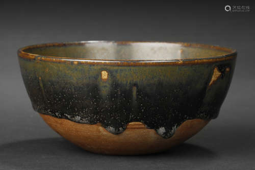 A BROWN GLAZED PORCELAIN BOWL