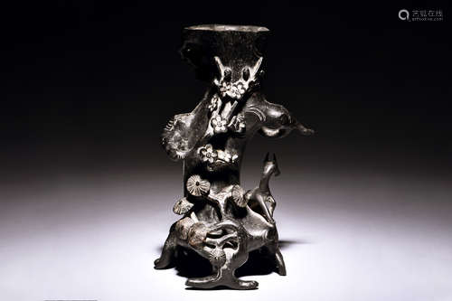 A CHINESE CARVED IRON PLUM BLOSSOM TREE TRUNK