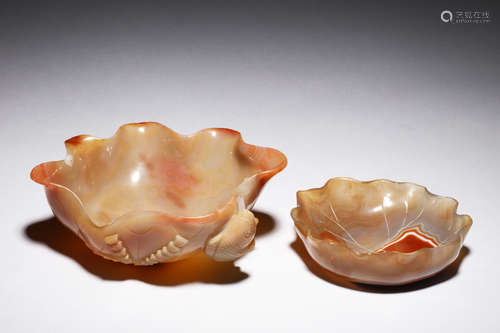 TWO CARVED AGATE WASHERS