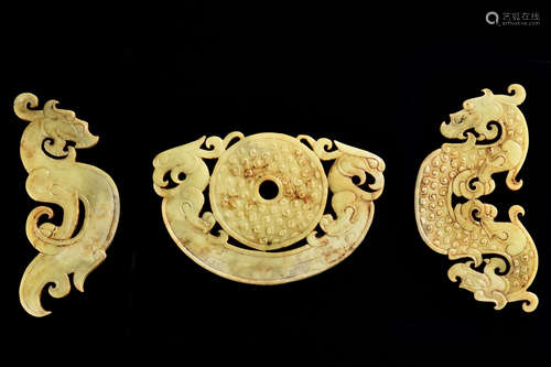 THREE ARCHAIC STYLE JADE ORNAMENTS