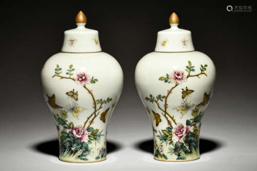 PAIR OF FAMILLE ROSE 'FLOWERS AND BUTTERFLIES' VASES WITH COVER