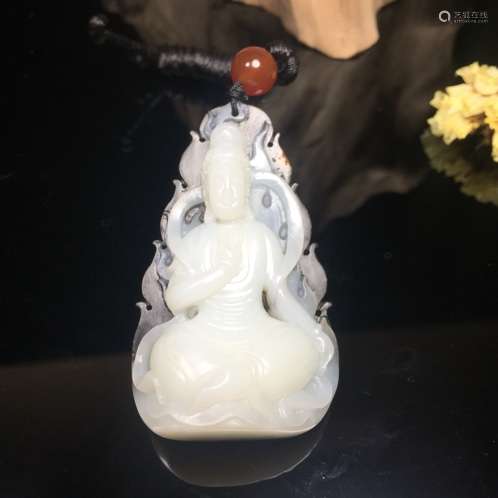 A NATURAL HETIAN JADE PENDANT