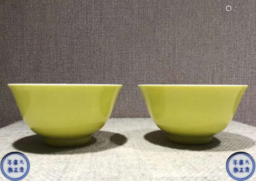 PAIR OF DAQING YONGZHENG NIANZHI YELLOW GLAZED BOWLS