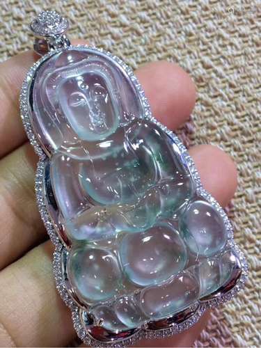 A NATURAL GUANYIN DESIGN JADEITE SCULPTURE