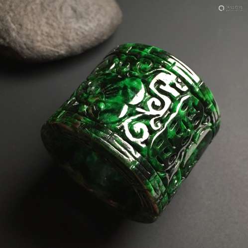 A NATURAL JADEITE ARCHER RING