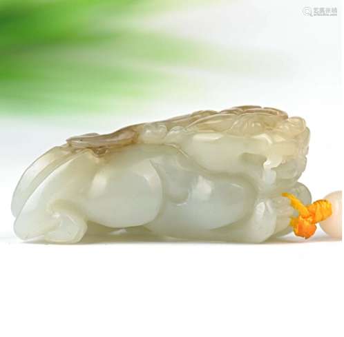 A NATURAL HETIAN JADE PENDANT