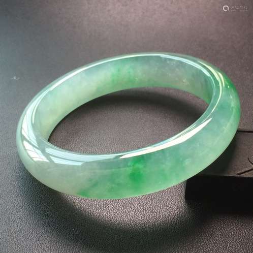 A NATURAL PIAOLV JADEITE BANGLE