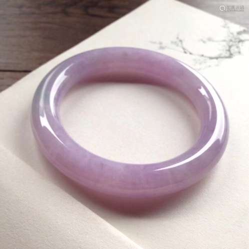 A NATURAL VIOLET JADEITE BANGLE