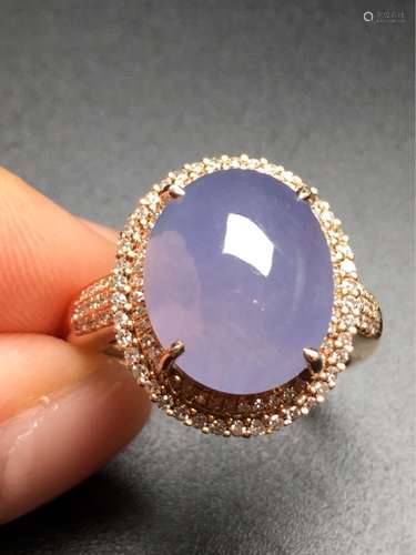 A NATURAL VIOLET JADEITE RING