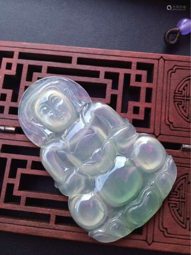 A NATURAL GUANYIN DESIGN JADEITE SCULPTURE