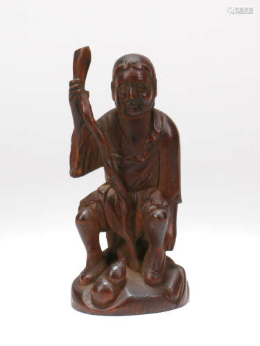 A Chinese Carved Hard Wood Figure 
