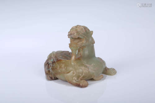 A Chinese Carved Jade Foo-Dog