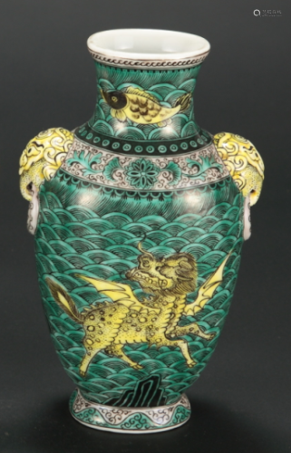 A Chinese Black Ground Green Glazed Porcelain Vase