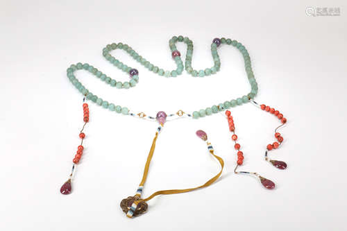 A Chinese Carved Jade Chaozhu Necklace