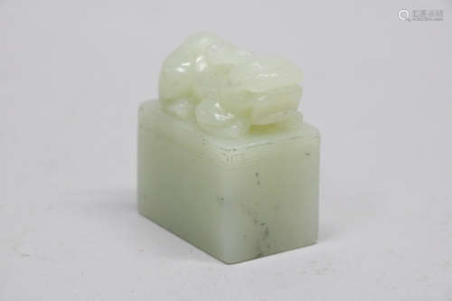 Chinese pale celadon jade seal with lion top