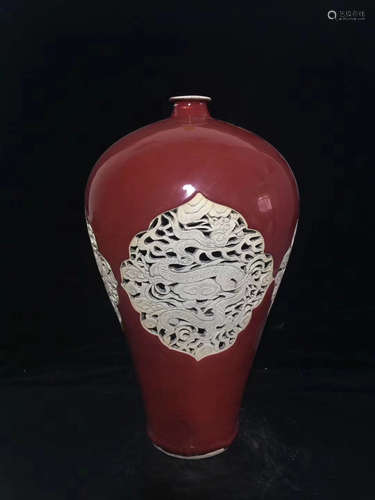 A RED GLAZE EXPOSED HOLLOW DRAGON TATTOO VASE,YUAN DYNASTY