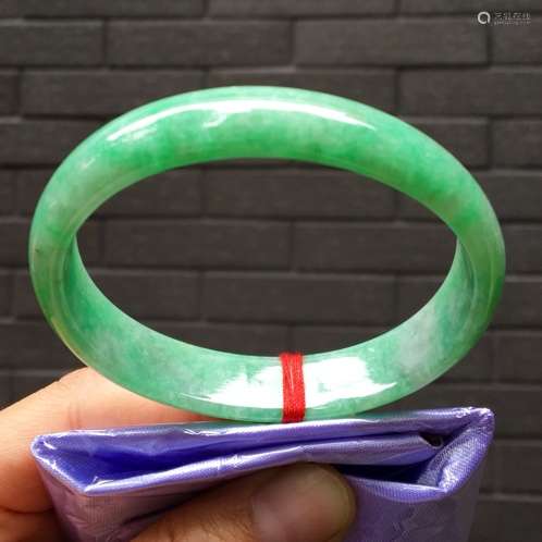 A NATURAL DOULV   JADEITE BANGLE