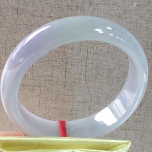 A NATURAL  JADEITE BANGLE