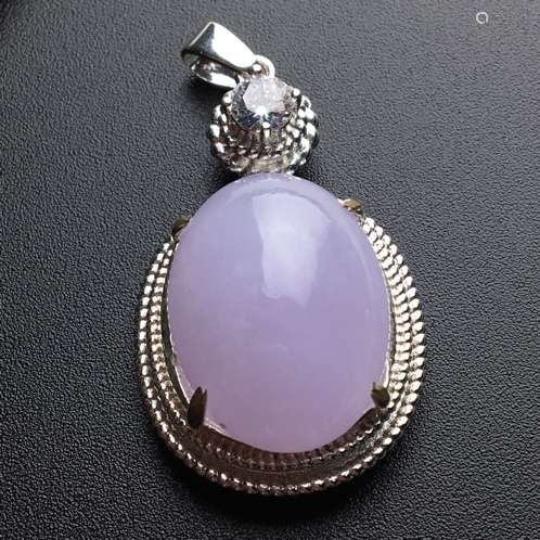 A NATURAL  ICY  JADEITE PENDANT WITH COPPER HOLDER