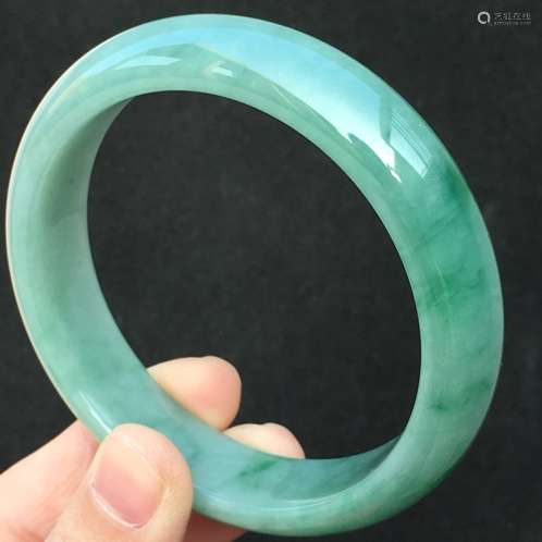 A NATURAL  JADEITE BANGLE