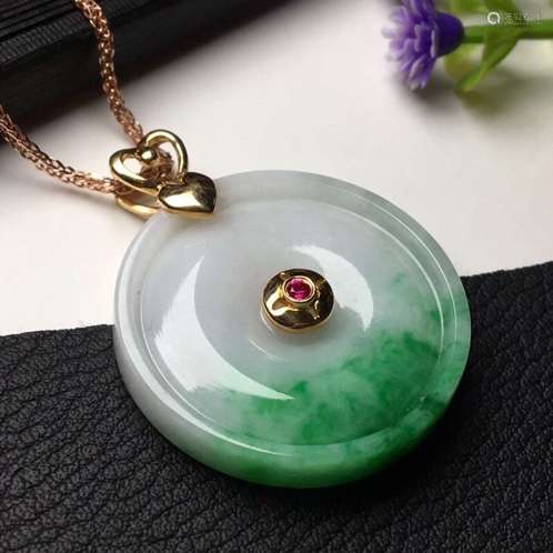 A NATURAL  JADEITE RING-SHAPED PENDANT