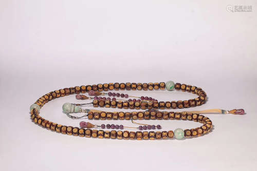 AN OLD STRING OF EAGLEWOOD BEADS