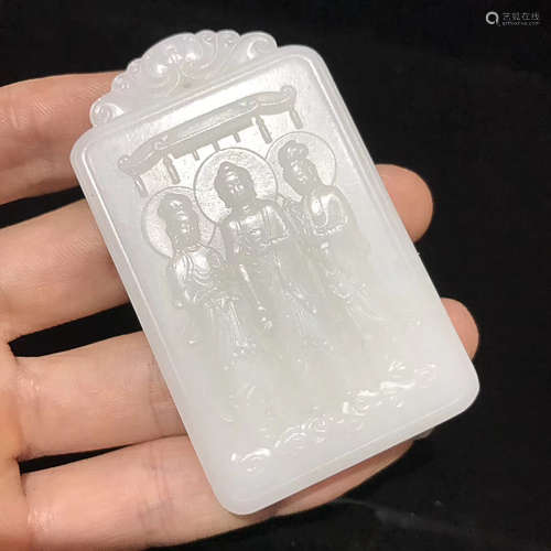 A WHITE JADE PENDANT WITH THE THREE BUDDHAS