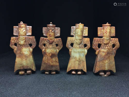 Four Chinese carved jade figures.