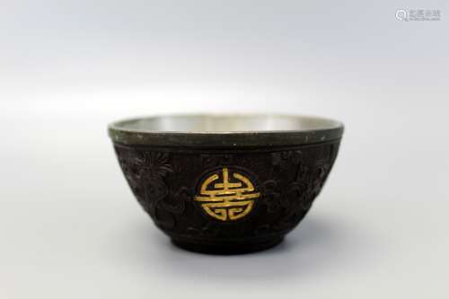 Chinese carved coconut shell cup.
