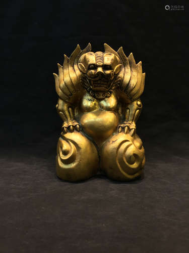 Chinese gilt bronze statue of a beast.