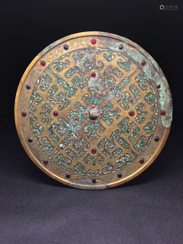 Chinese gilt bronze mirror.