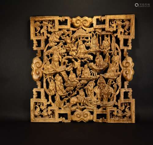 A Carved Wood Plaque