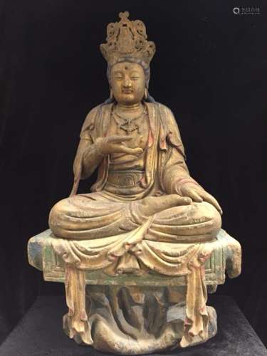 A Carved Wood Buddha Statue