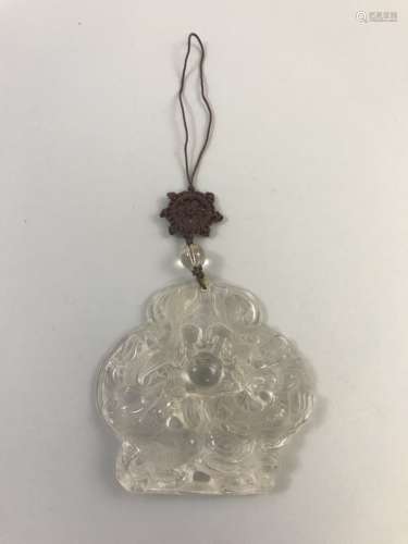 A Carved Crystal Dragon Pendant